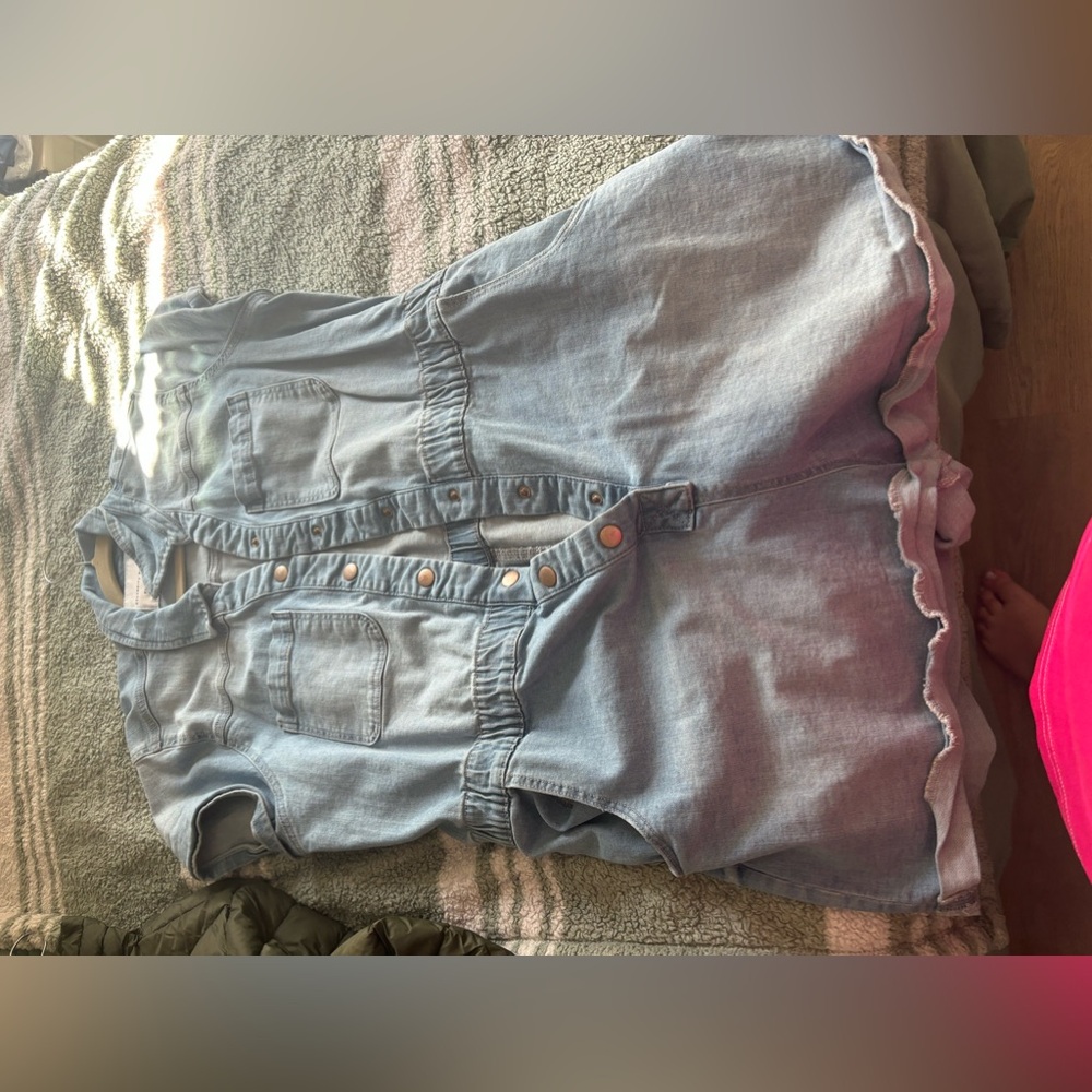 Celebrity pink Jean romper never worn.